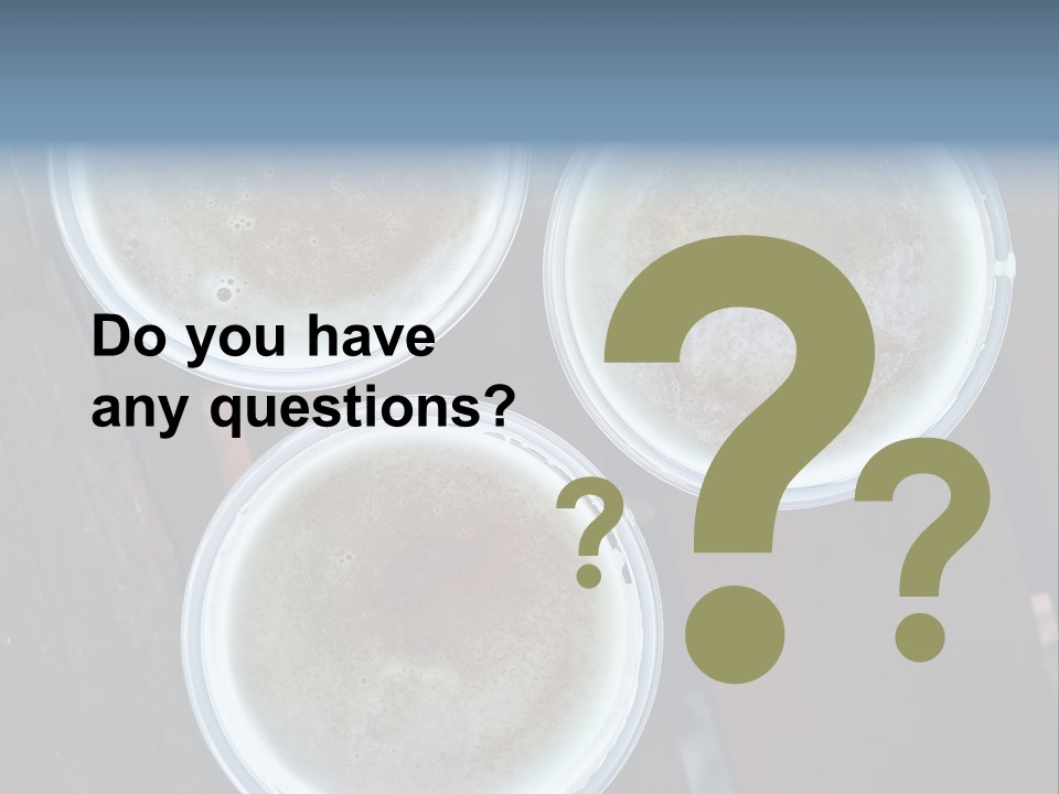 Three Cups Of Coffee Sitting On Top Of A Wooden Table PowerPoint Template