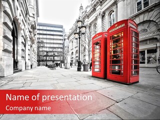 A Red Telephone Booth On A City Street PowerPoint Template