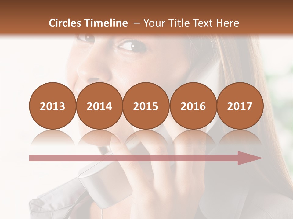 A Woman Talking On A Phone With A Smile On Her Face PowerPoint Template