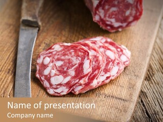 A Piece Of Raw Meat On A Cutting Board With A Knife PowerPoint Template