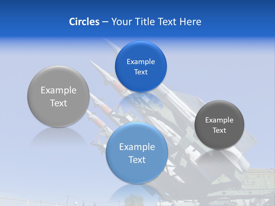 A Group Of Missiles On Display In Front Of A Blue Sky PowerPoint Template