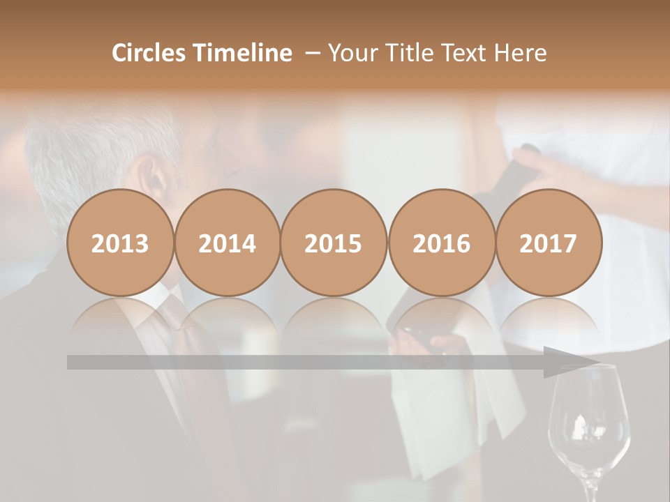 A Man In A Suit Holding A Bottle Of Wine PowerPoint Template