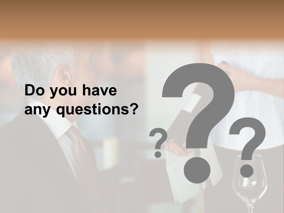 A Man In A Suit Holding A Bottle Of Wine PowerPoint Template