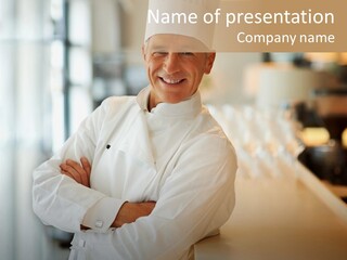 A Chef Standing In Front Of A Counter With His Arms Crossed PowerPoint Template
