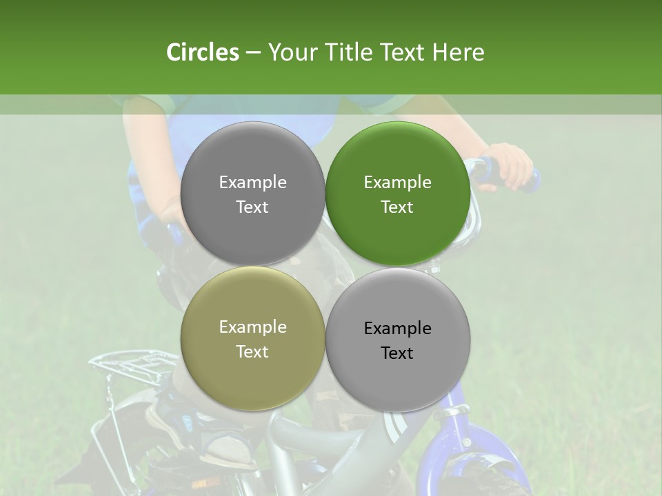 A Young Boy Is Riding A Bike In The Grass PowerPoint Template