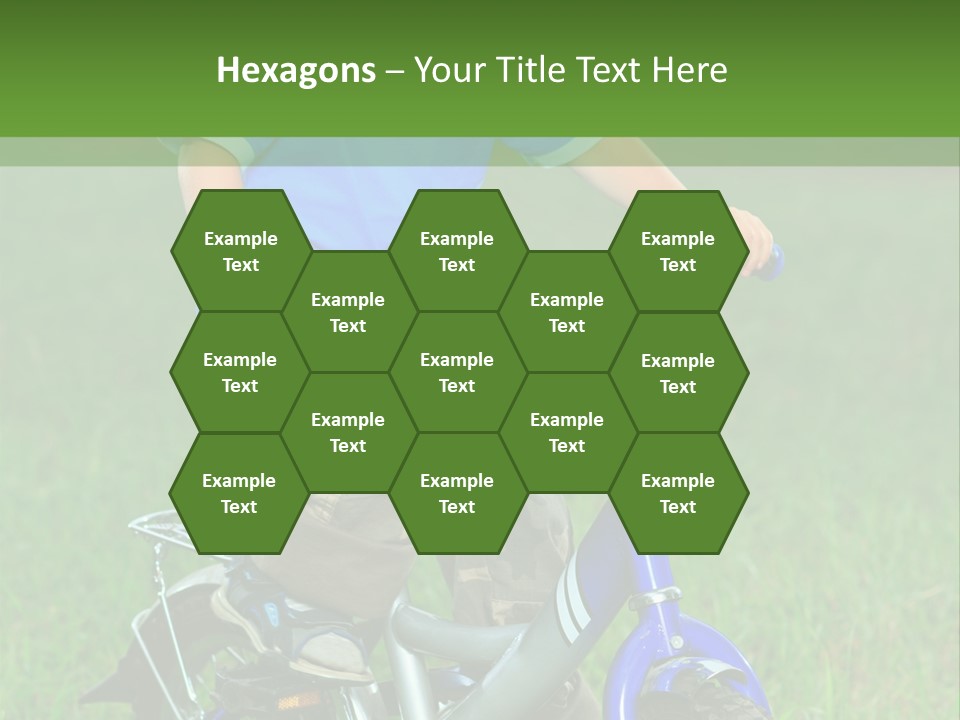 A Young Boy Is Riding A Bike In The Grass PowerPoint Template