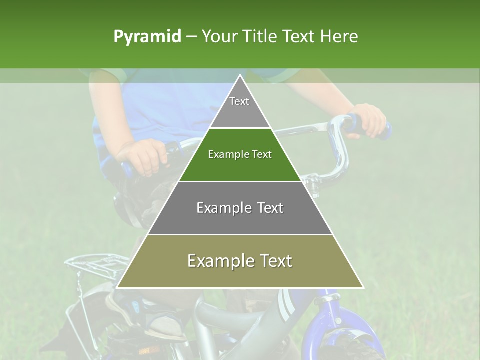 A Young Boy Is Riding A Bike In The Grass PowerPoint Template