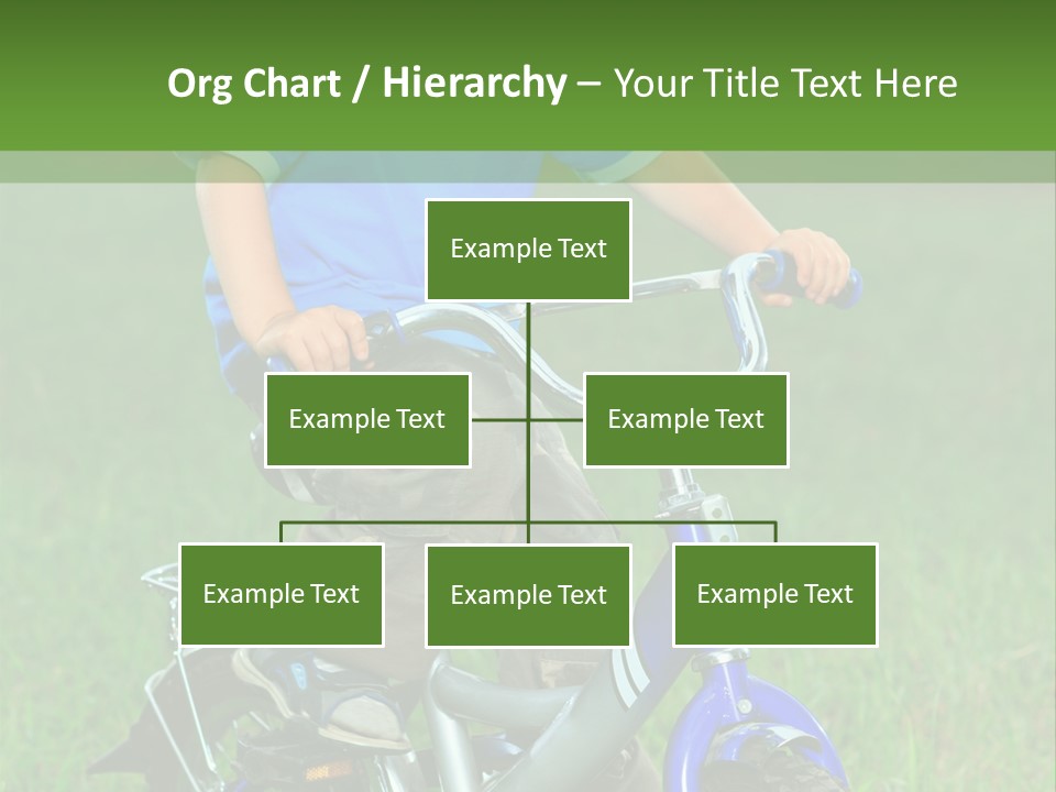 A Young Boy Is Riding A Bike In The Grass PowerPoint Template