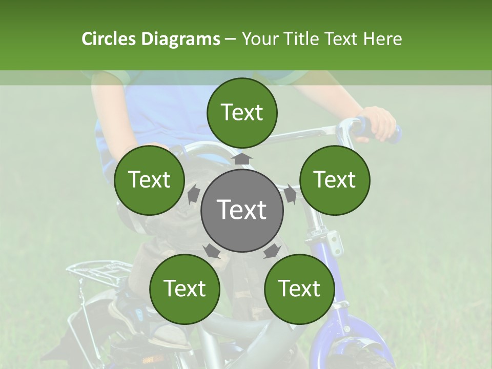 A Young Boy Is Riding A Bike In The Grass PowerPoint Template