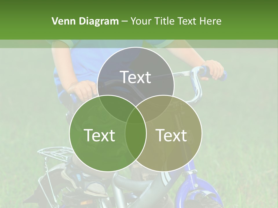 A Young Boy Is Riding A Bike In The Grass PowerPoint Template
