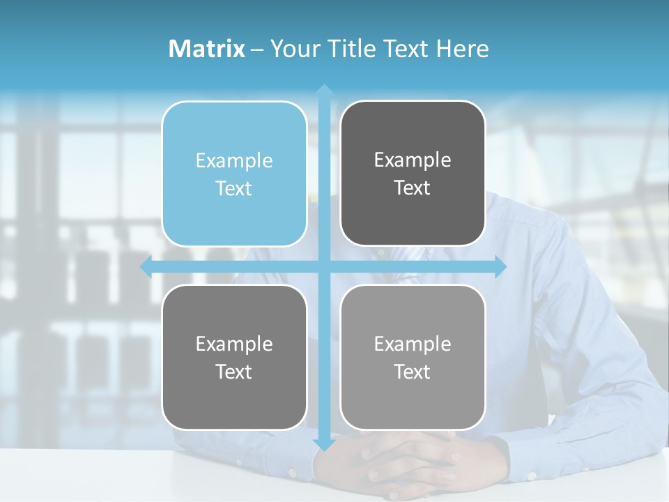 A Man In A Blue Shirt And Tie Sitting At A Table PowerPoint Template