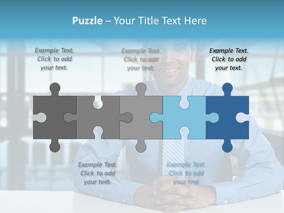 A Man In A Blue Shirt And Tie Sitting At A Table PowerPoint Template