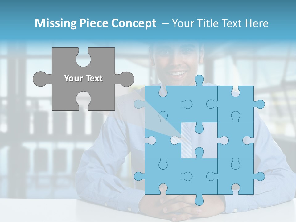 A Man In A Blue Shirt And Tie Sitting At A Table PowerPoint Template