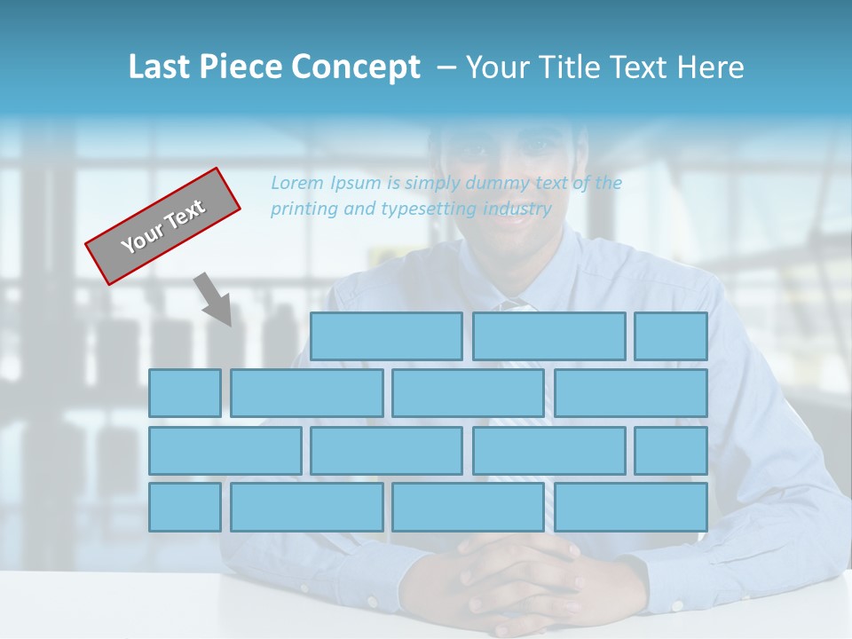 A Man In A Blue Shirt And Tie Sitting At A Table PowerPoint Template