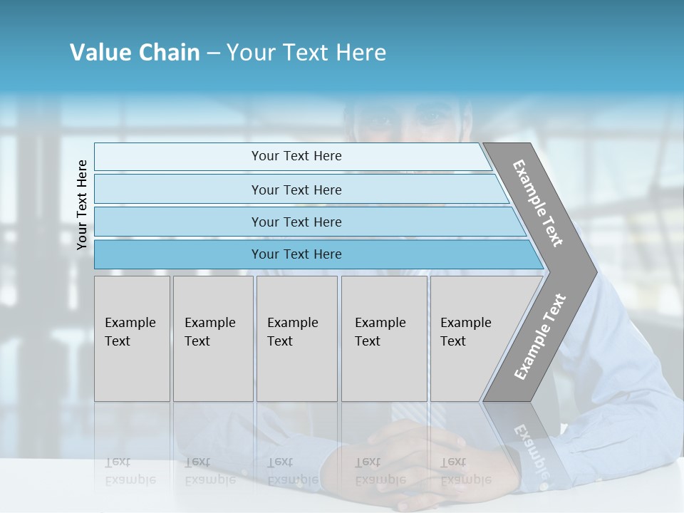 A Man In A Blue Shirt And Tie Sitting At A Table PowerPoint Template