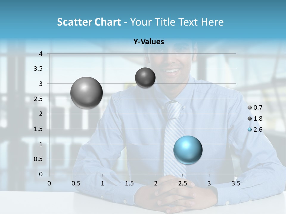 A Man In A Blue Shirt And Tie Sitting At A Table PowerPoint Template