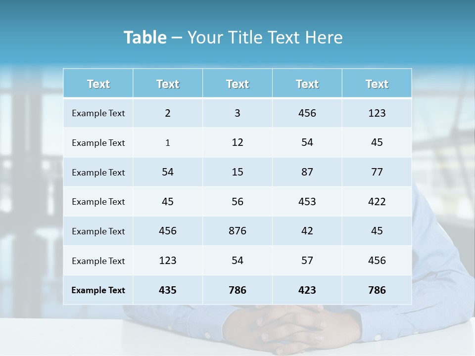 A Man In A Blue Shirt And Tie Sitting At A Table PowerPoint Template