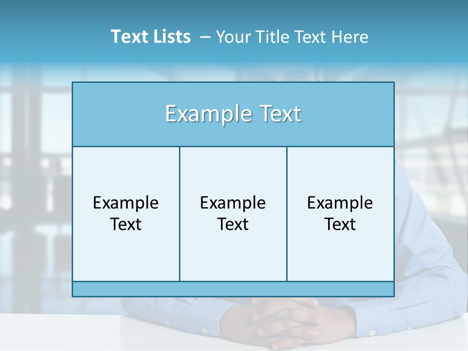 A Man In A Blue Shirt And Tie Sitting At A Table PowerPoint Template