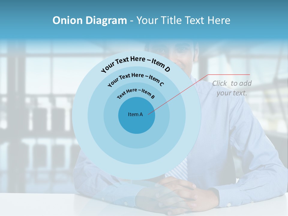 A Man In A Blue Shirt And Tie Sitting At A Table PowerPoint Template