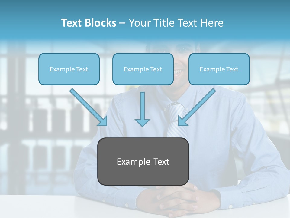 A Man In A Blue Shirt And Tie Sitting At A Table PowerPoint Template