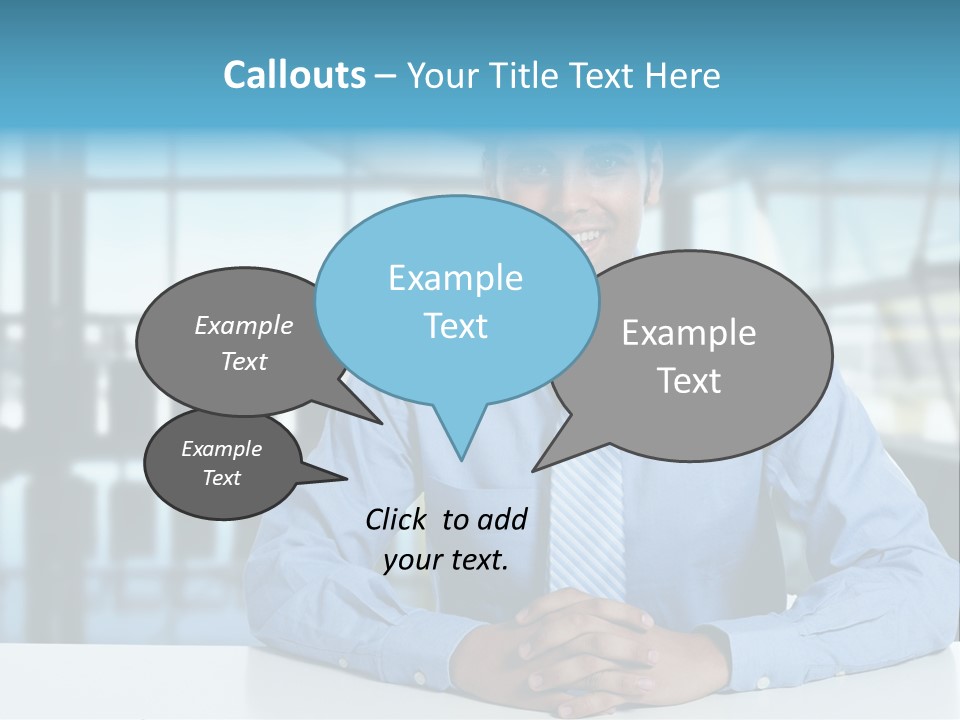 A Man In A Blue Shirt And Tie Sitting At A Table PowerPoint Template