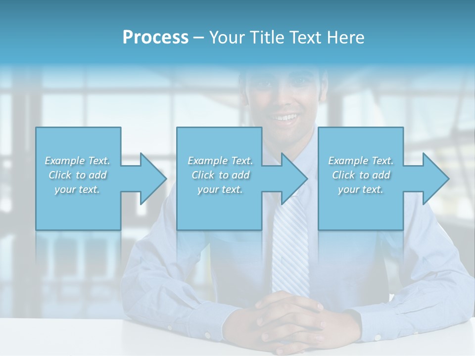 A Man In A Blue Shirt And Tie Sitting At A Table PowerPoint Template