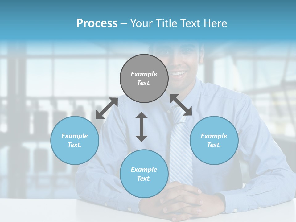 A Man In A Blue Shirt And Tie Sitting At A Table PowerPoint Template