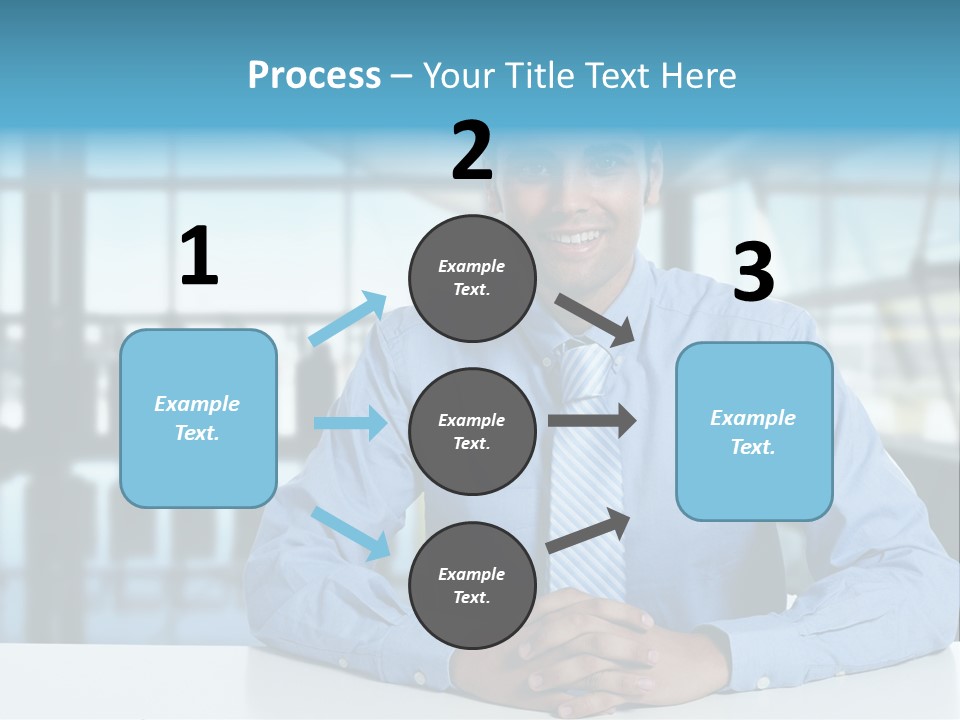 A Man In A Blue Shirt And Tie Sitting At A Table PowerPoint Template