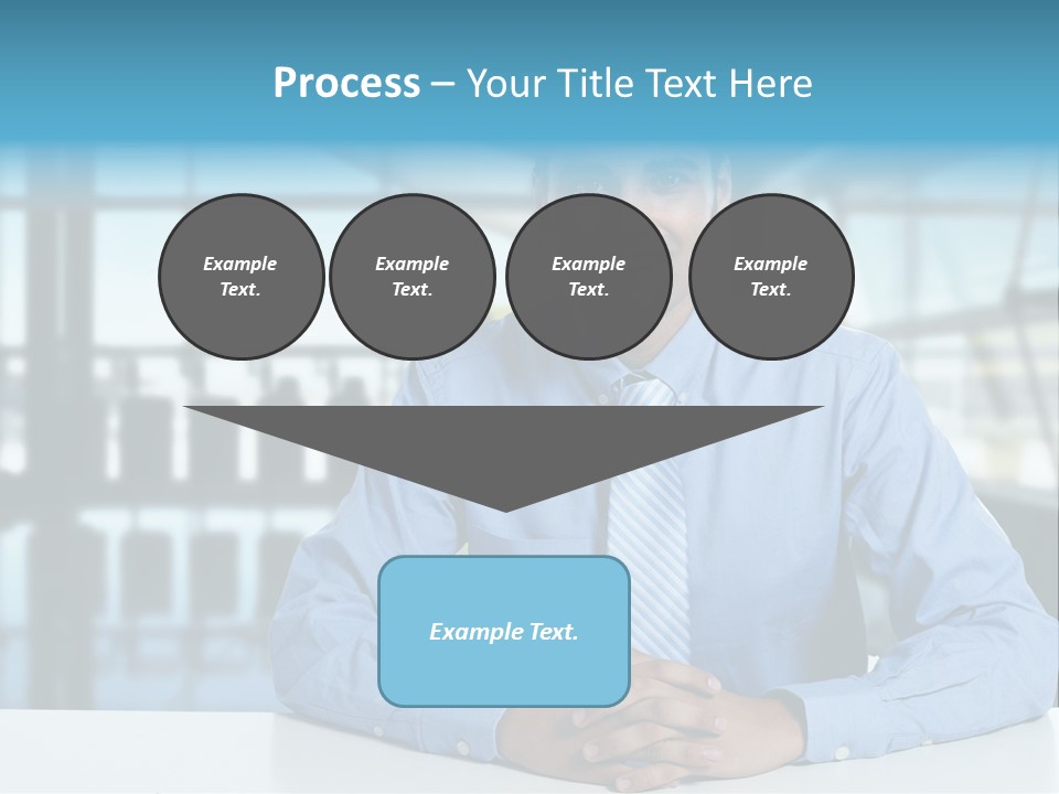 A Man In A Blue Shirt And Tie Sitting At A Table PowerPoint Template