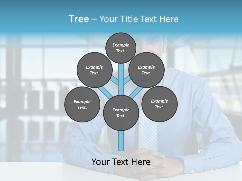 A Man In A Blue Shirt And Tie Sitting At A Table PowerPoint Template