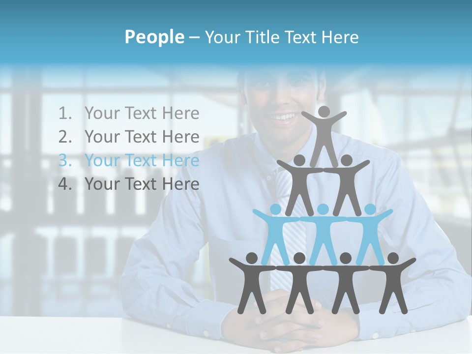 A Man In A Blue Shirt And Tie Sitting At A Table PowerPoint Template