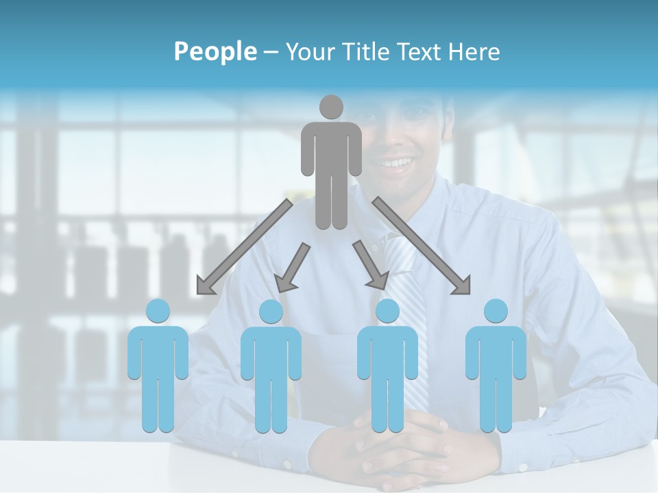 A Man In A Blue Shirt And Tie Sitting At A Table PowerPoint Template