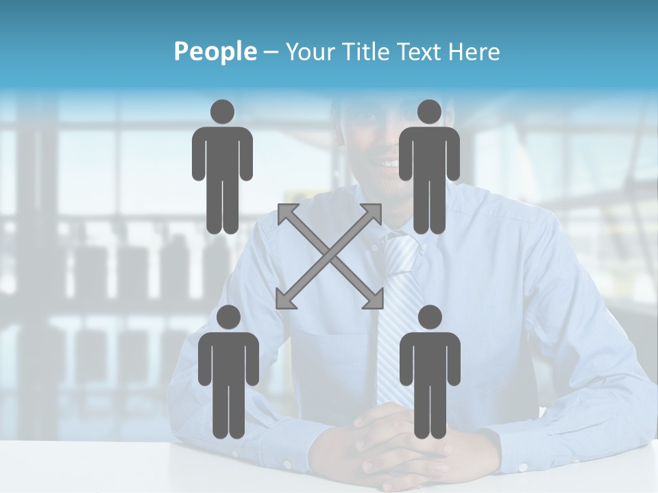 A Man In A Blue Shirt And Tie Sitting At A Table PowerPoint Template