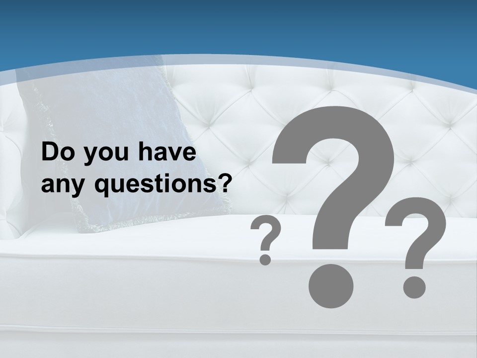 A White Couch With A Blue Pillow On It PowerPoint Template