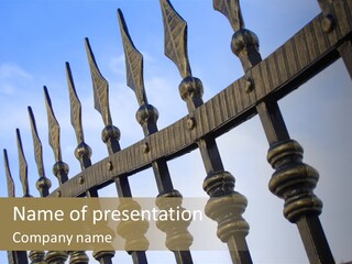 A Metal Fence With A Blue Sky In The Background PowerPoint Template