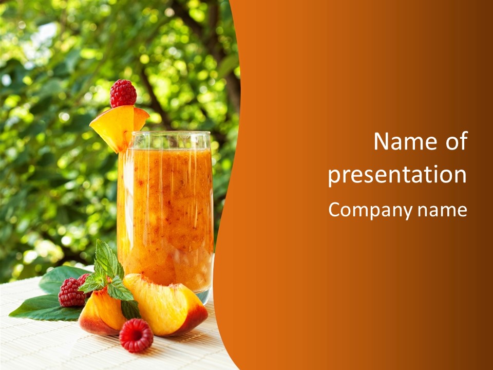 A Glass Of Orange Juice With Raspberries On A Table PowerPoint Template