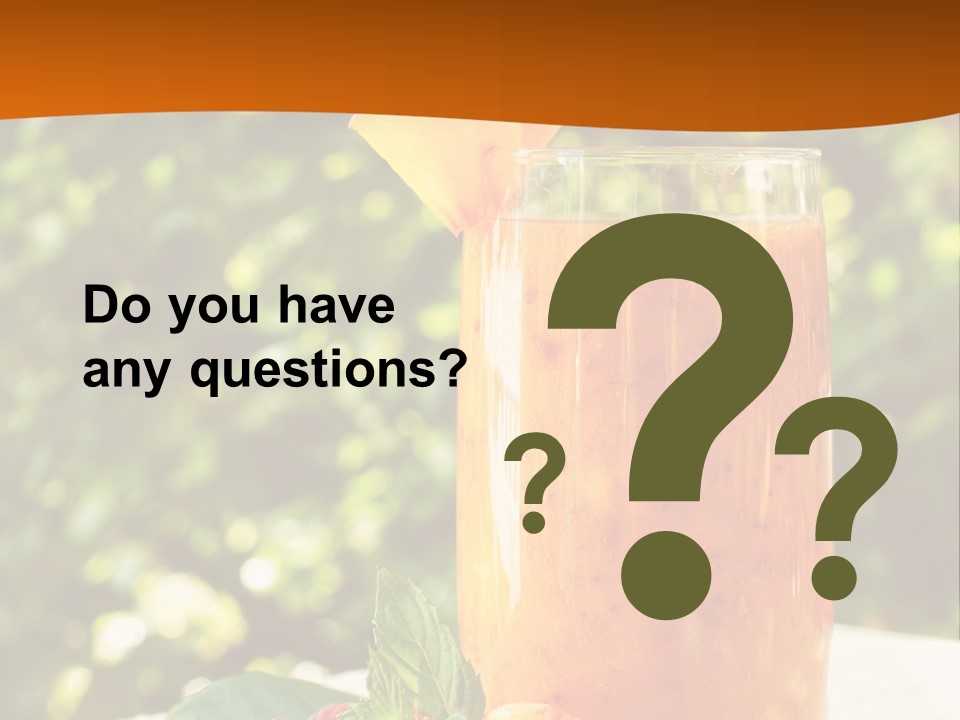 A Glass Of Orange Juice With Raspberries On A Table PowerPoint Template