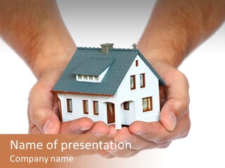 A Person Holding A Small House In Their Hands PowerPoint Template