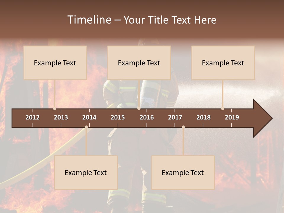 A Firefighter Spraying Water On A Fire PowerPoint Template