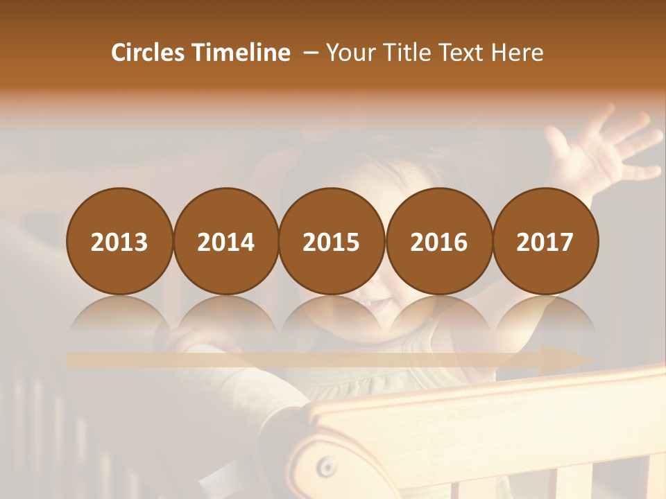 A Baby In A Crib With A Cast On It's Arm PowerPoint Template