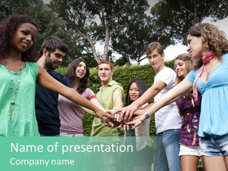 A Group Of People Holding Hands In A Circle PowerPoint Template