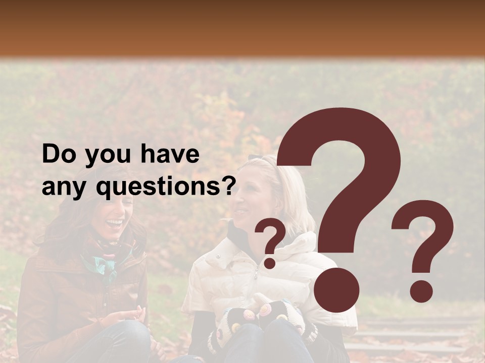 Two Women Sitting On The Ground Talking To Each Other PowerPoint Template