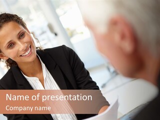 A Woman Sitting At A Desk Talking To A Man PowerPoint Template