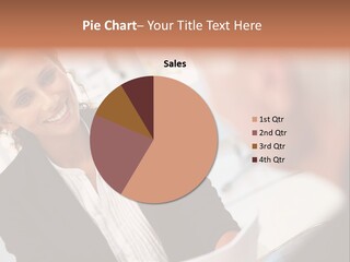 A Woman Sitting At A Desk Talking To A Man PowerPoint Template