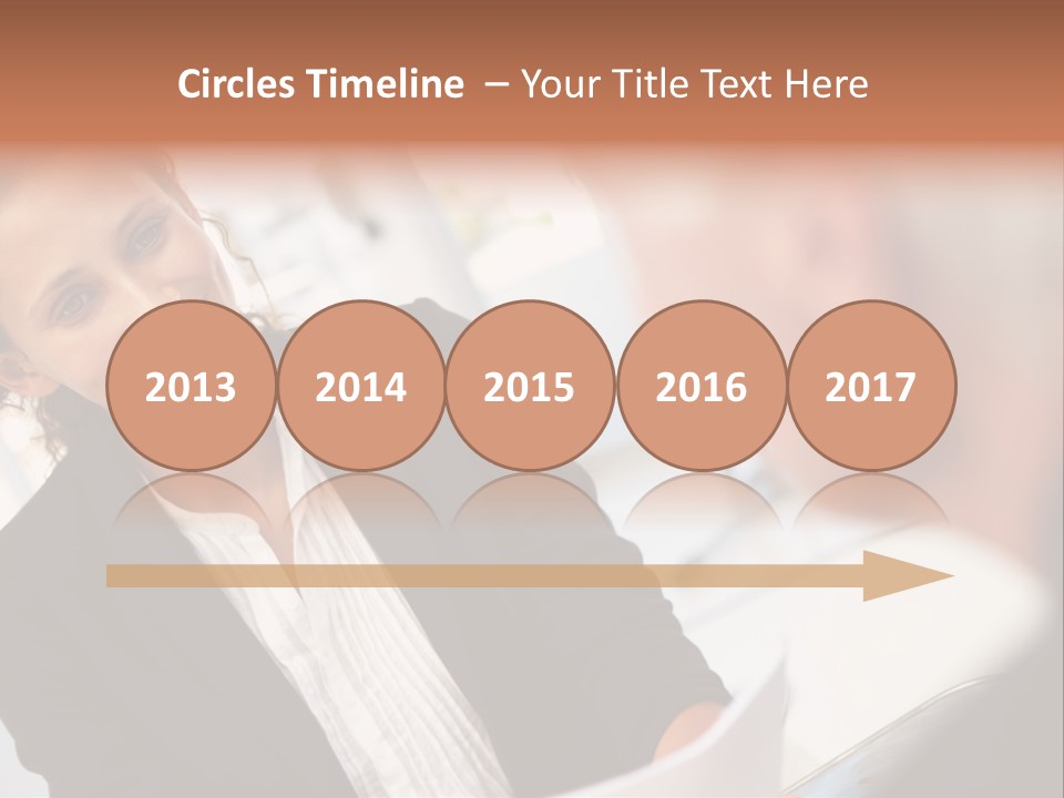 A Woman Sitting At A Desk Talking To A Man PowerPoint Template