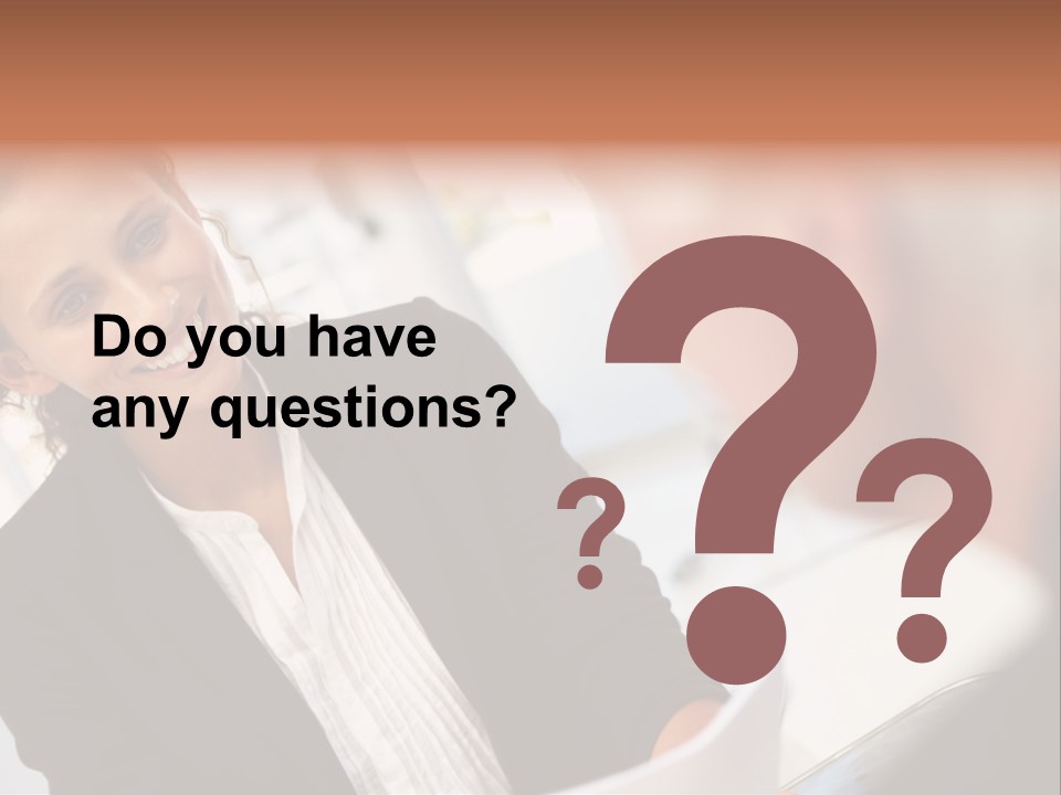 A Woman Sitting At A Desk Talking To A Man PowerPoint Template