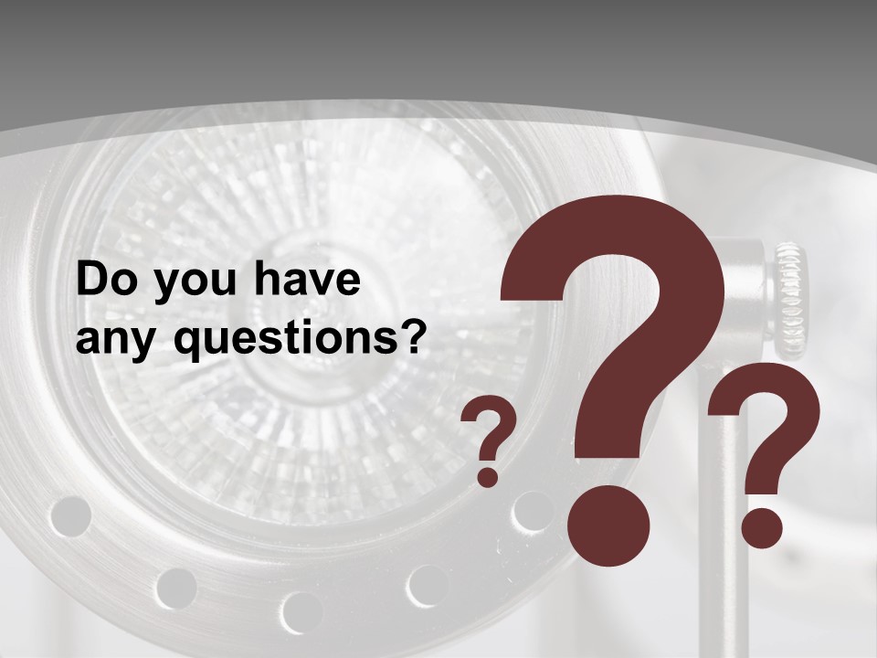 A Close Up Of A Metal Object With A White Background PowerPoint Template