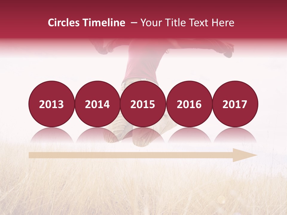 A Woman Jumping In The Air In A Field PowerPoint Template