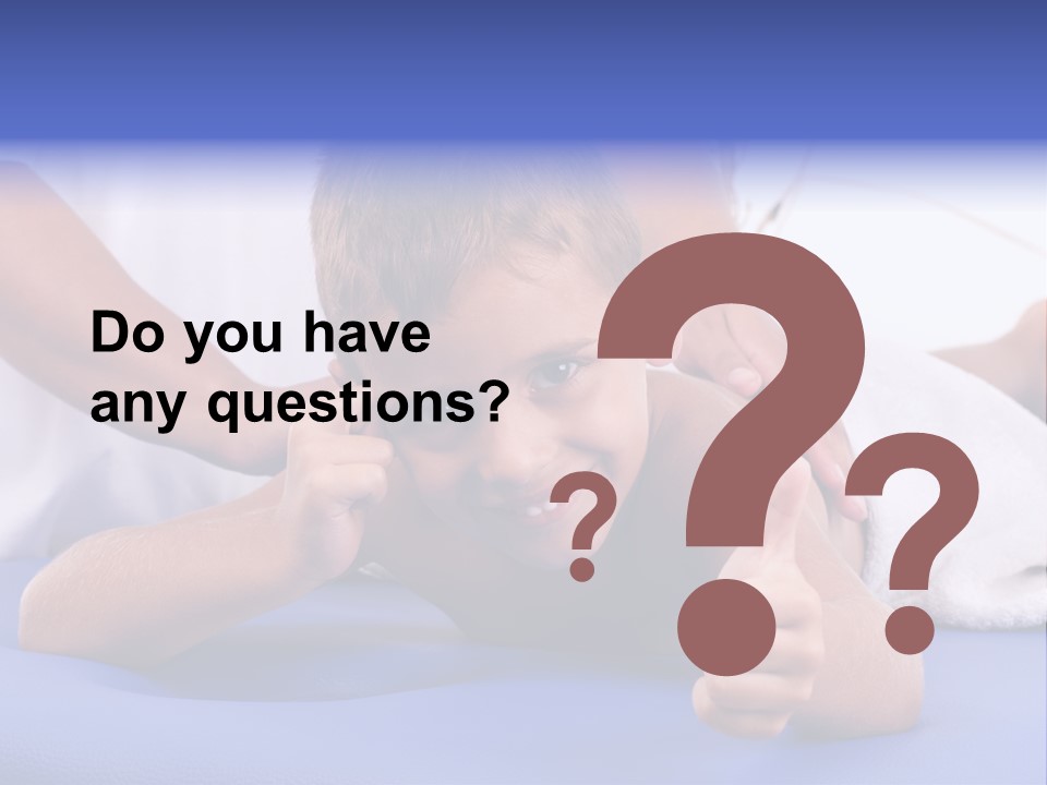 A Young Boy Is Smiling And Giving A Thumbs Up PowerPoint Template