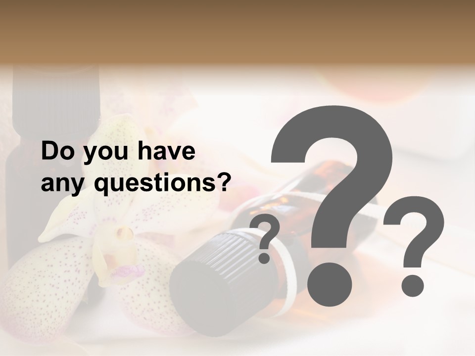 A Bottle Of Essential Oils Next To A Flower PowerPoint Template